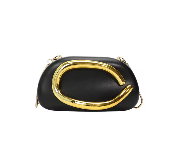 Sac noir à détail doré sculptural